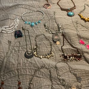 15 paparazzi necklaces.